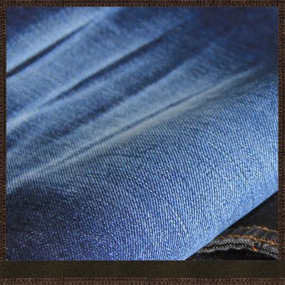 【布廠價供應四片右斜 棉滌彈牛仔面料 12盎司秋冬時裝面料款】價格,廠家,圖片,棉面料,東莞市龍誼紡織-